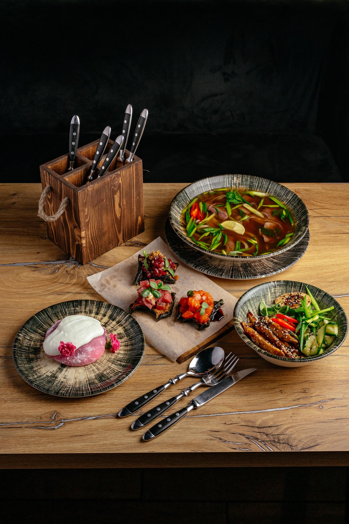 Set of plated dishes arranged for tasting